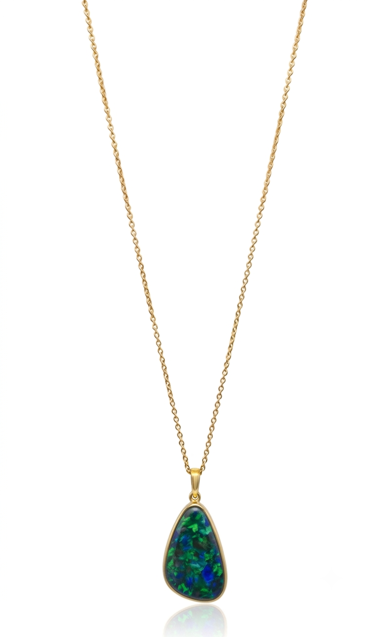 18ct. Yellow Gold handcrafted teardrop pendant featuring a dark opal with rich, deep emerald green and royal blue iridescence. The pendant is suspended from a 9ctct yellow gold Rolo chain, 45cm with a 42 cm station.