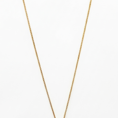 9ct Yellow Gold necklace with a pear-cut cabochon Emerald pendant suspended from a 9ct yellow gold wheet chain.