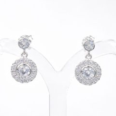 Elegant sterling silver drop earrings featuring round cubic zirconia studs with halo-set dangling discs. With push on butterflies.