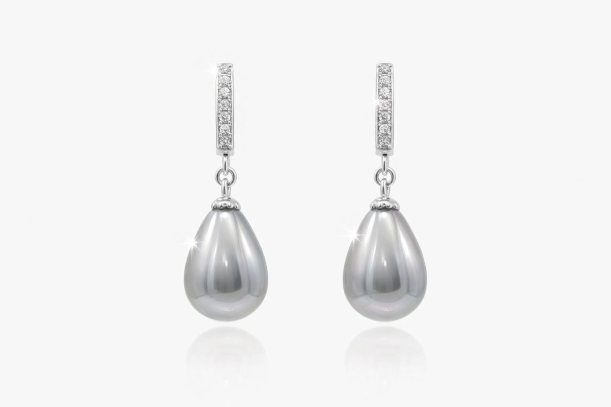 Pair of sterling silver drop earrings featuring light grey teardrop shell pearls suspended from a single row of sparkling cubic zirconia set in silver.