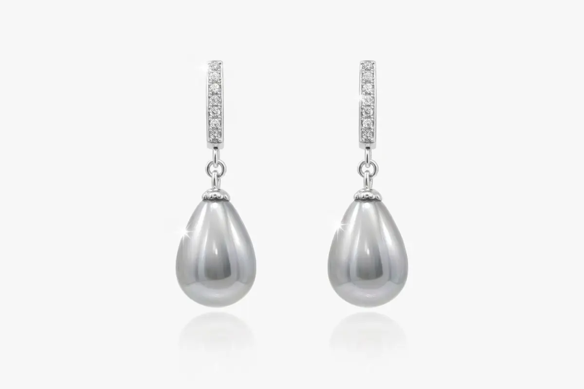 Pair of sterling silver drop earrings featuring light grey teardrop shell pearls suspended from a single row of sparkling cubic zirconia set in silver.