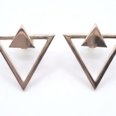 A pair of geometric, rose gold-plated stud earrings featuring a double-triangle design. two in one earring with push on butterflies.