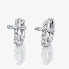 Pair of sterling silver huggie hoop earrings featuring cross motifs encrusted with brilliant cubic zirconia stones.