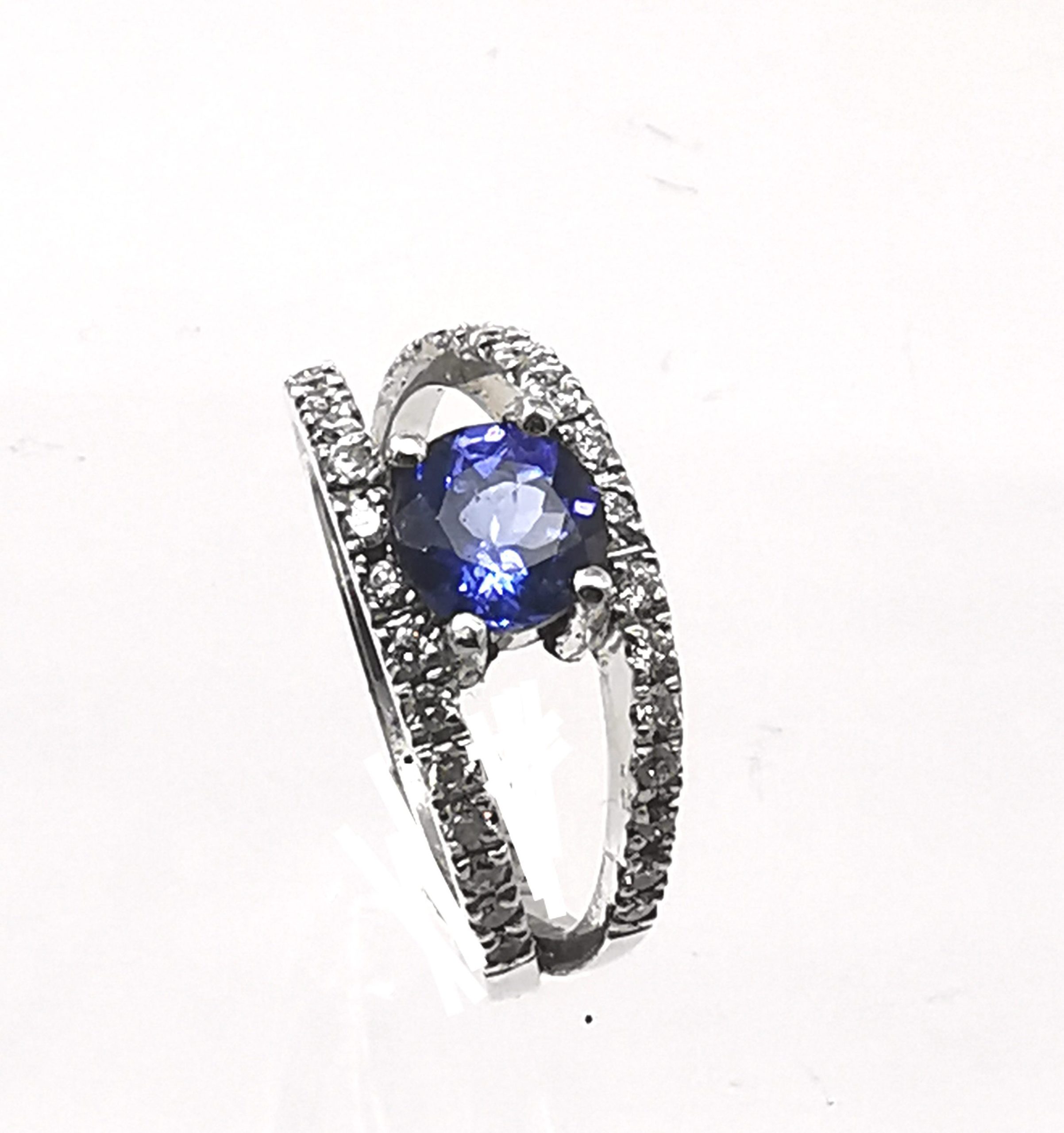 Andrea Platinum Tanzanite and Diamond Halo Ring