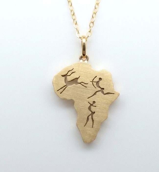 Crafted in 9ct yellow gold, this map-of-Africa pendant features detailed cut-out artwork depicting classis San rock art motifs-a jumping buck and traditional figures. Featuring a subtle brushed finish that catches the light, it hangs elegant from a 9ct matching fine gold chain.