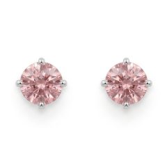 1777303484860 A pair of delicate, round-cut pink sapphire stud earrings set in high-polish white gold claw settings, featuring a soft "alt rosa" pink hue and brilliant facets.