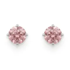 1777303484860 A pair of delicate, round-cut pink sapphire stud earrings set in high-polish white gold claw settings, featuring a soft "alt rosa" pink hue and brilliant facets.