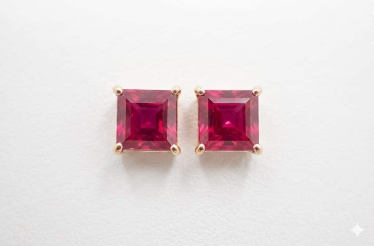 Feigl Custom-designed 9ct yellow gold studs featuring vribrant square-cut rubies, perfect for everyday sophistication.