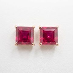 Custom-designed 9ct yellow gold studs featuring vribrant square-cut rubies, perfect for everyday sophistication.