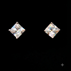 Luxury princess-cut Cubic Zirconia sterling silver stud earrings in a four-prong setting with vibrant fire and sparkle.