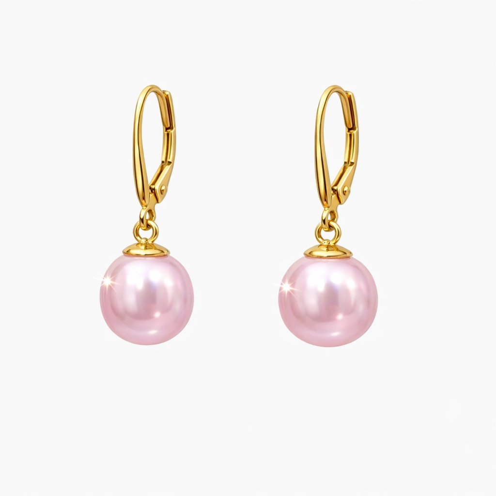 Pair of gold‑plated drop earrings featuring round light rose‑lavender freshwater pearls with a soft natural daylight sheen, suspended from polished lever‑back clasps.