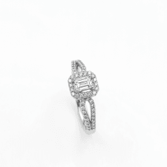 Dade Women's sterling silver halo ring with a rectangle emerald-cut clear cubic zirconia center stone, micro-pave halo, and split-shank band set with round accent stones.