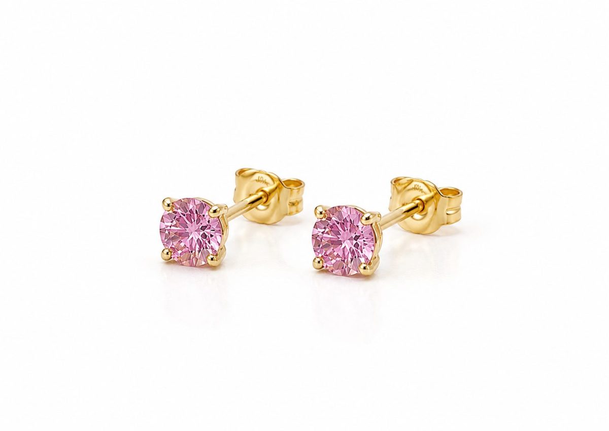 Pair of 9ct. Yellow gold stud earrings featuring roundpink sapphires in four-prong settings, shown with butterfly backs.