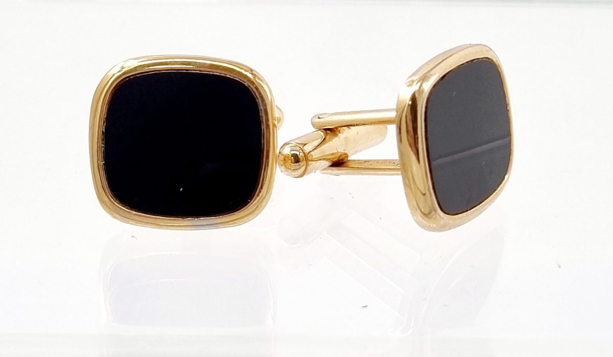 Men's luxury gold-plated cufflinks with rectangular black onyx stone; formal wedding and evening wear accessories.