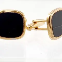 Men's luxury gold-plated cufflinks with rectangular black onyx stone; formal wedding and evening wear accessories.