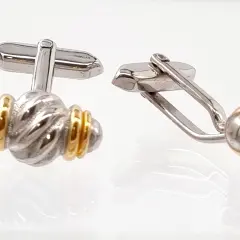 Luxury rugby-themed cufflinks accessory in polished stainless steel with 18ct gold plating; sports-inspired men's jewelry.