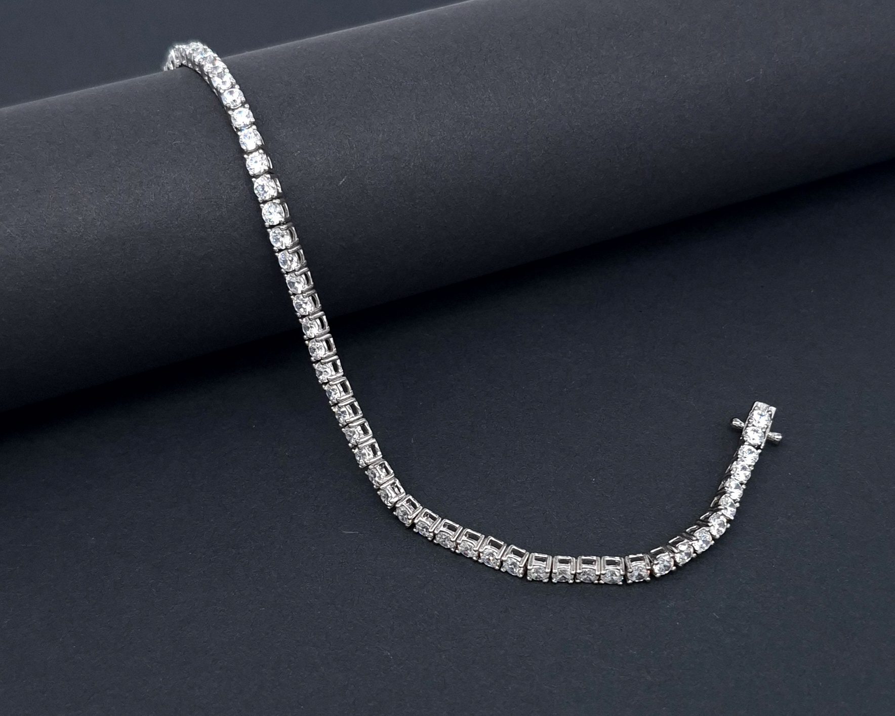 Jaida silver tennis bracelet with Cubic Zirconia stones.