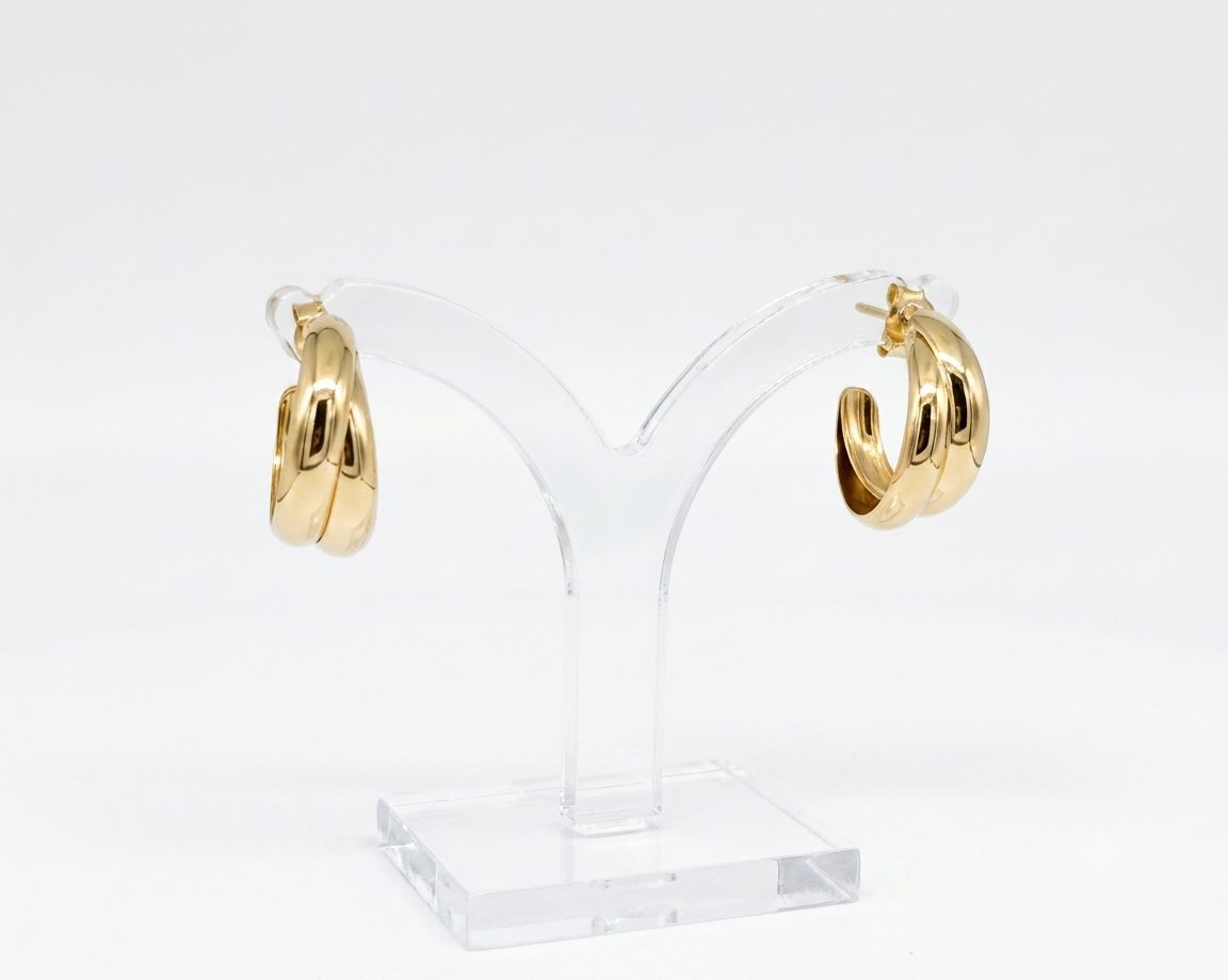 Finja A pair of shiny 9ct. gold hoop earrings, with push on butterflies, for everyday wear.