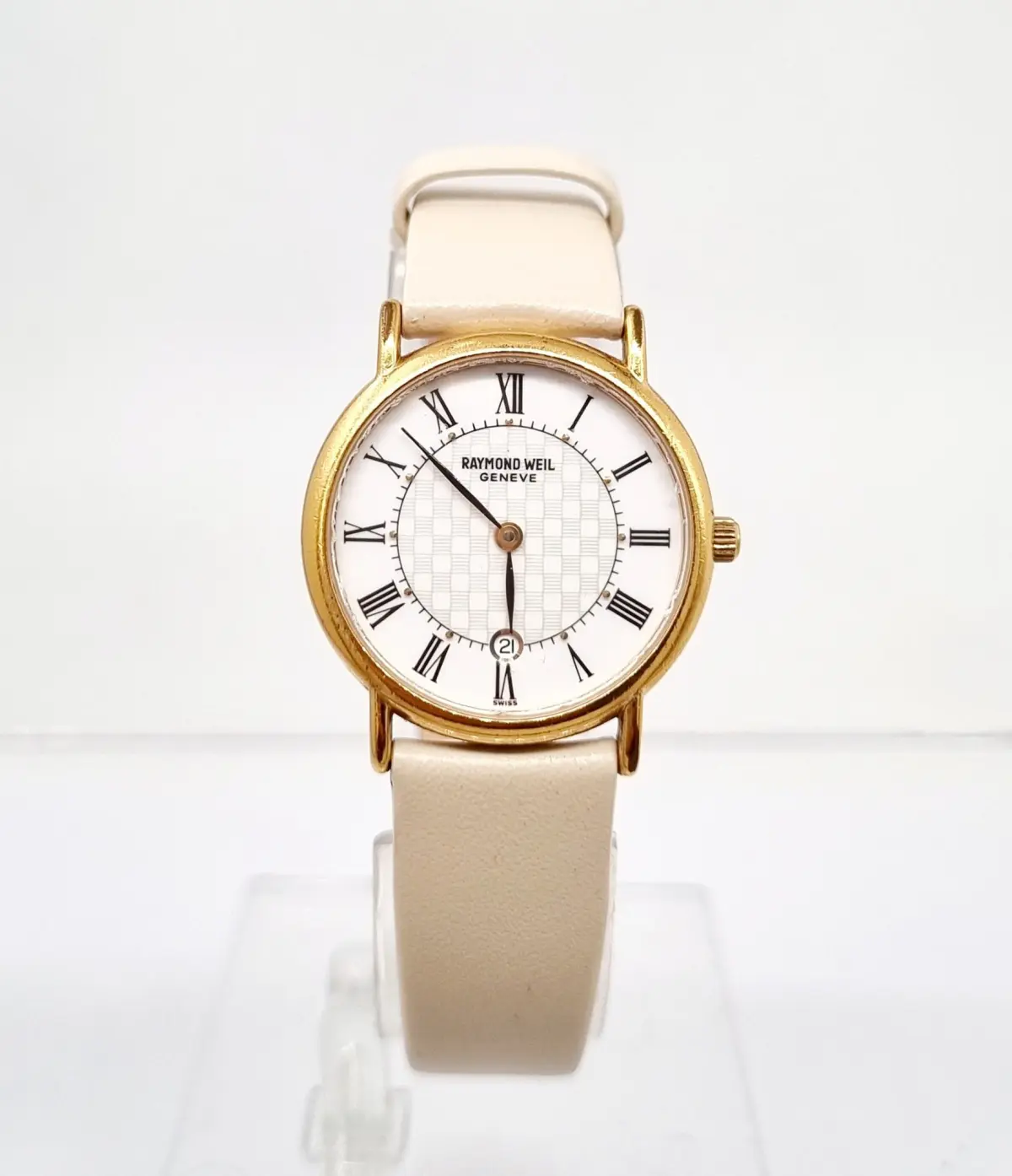 20240521_175223Kerry Vintage Raymond Weil Geneve gold-plated dress watch with white checkered dial, Roman numerals, and a cream leather strap.