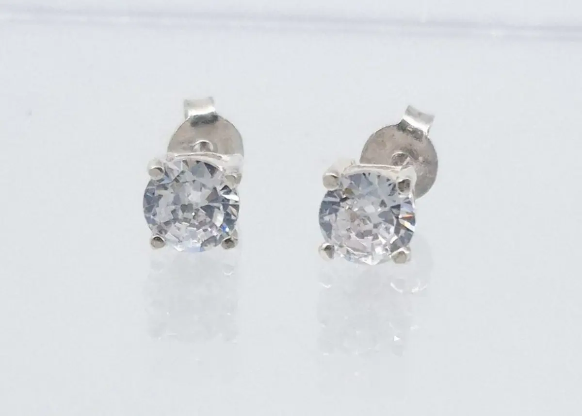 Frienda Sterling Silver 4 claw 5mm round Cubic Zirconia studs with push on butterflies