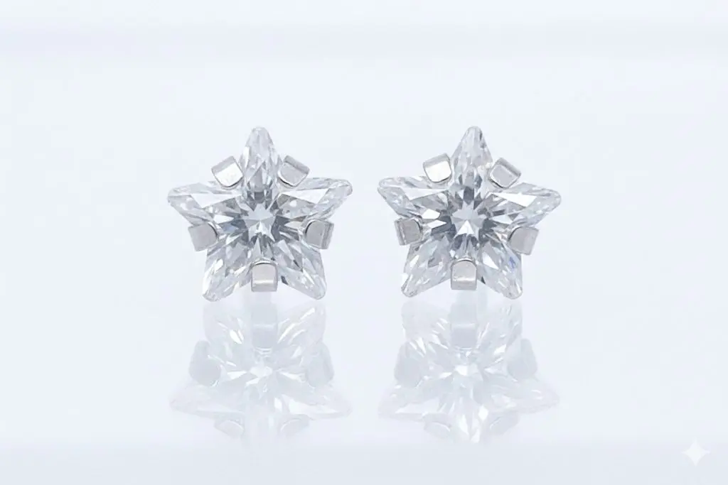 Fies 9ct White gold star shaped Cubic Zirconia with push on butterflies
