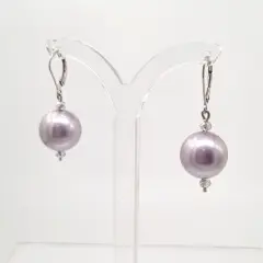 Silver Continental ear rings with 14mm round lilac Shell Pearls, hugged with crystals on top and bottom.