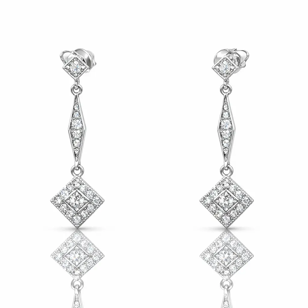 20241112_184214.jpg Exquisite 14ct white gold dangling earrings featuring sparkling diamonds with cool, icy brilliance.