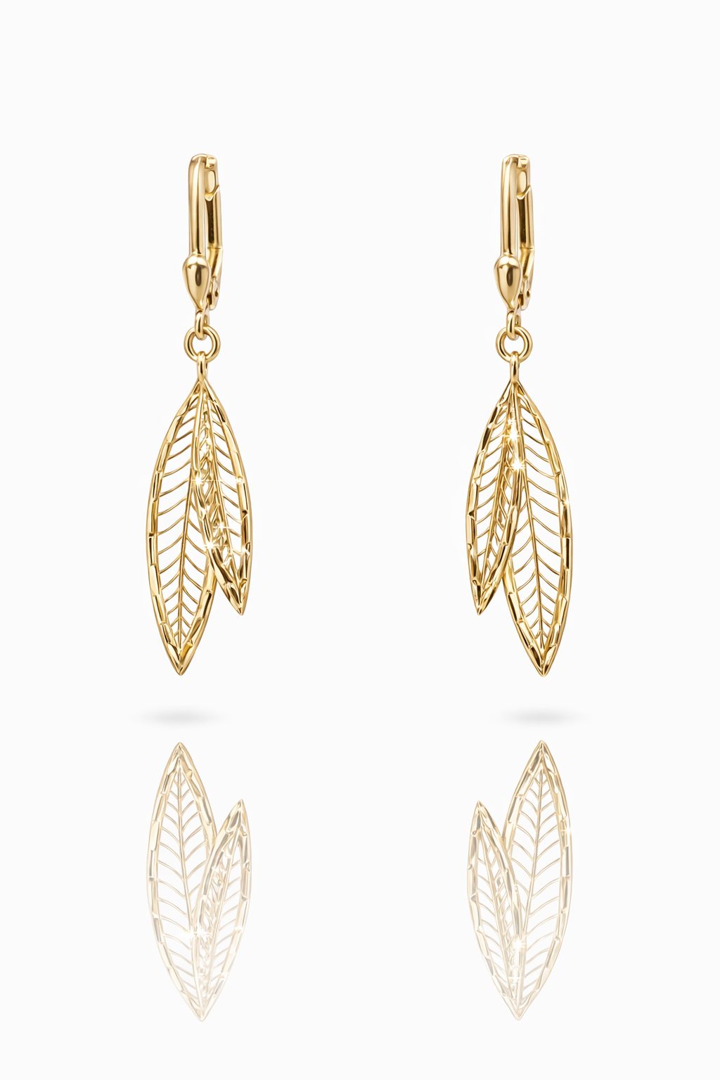 Elegant 9ct yellow gold dangling earrings featuring intricate leaf-shaped pendants with fine openwork detailing.