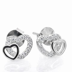 Sterling silver interlocking heart stud earrings featuring one polished heart and one heart encrusted with sparkling cubic zirconia stones.