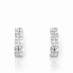 Pair of 9ct white gold cubic zirconia stud earrings with double curved rows of sparkling stones.