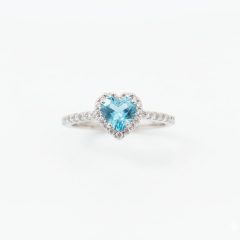 18ct white gold heart blue topaz ring; 0.50ct topaz with 0.72ct diamond halo and band; size M.5 luxury gemstone engagement or anniversary ring; 3.2g.