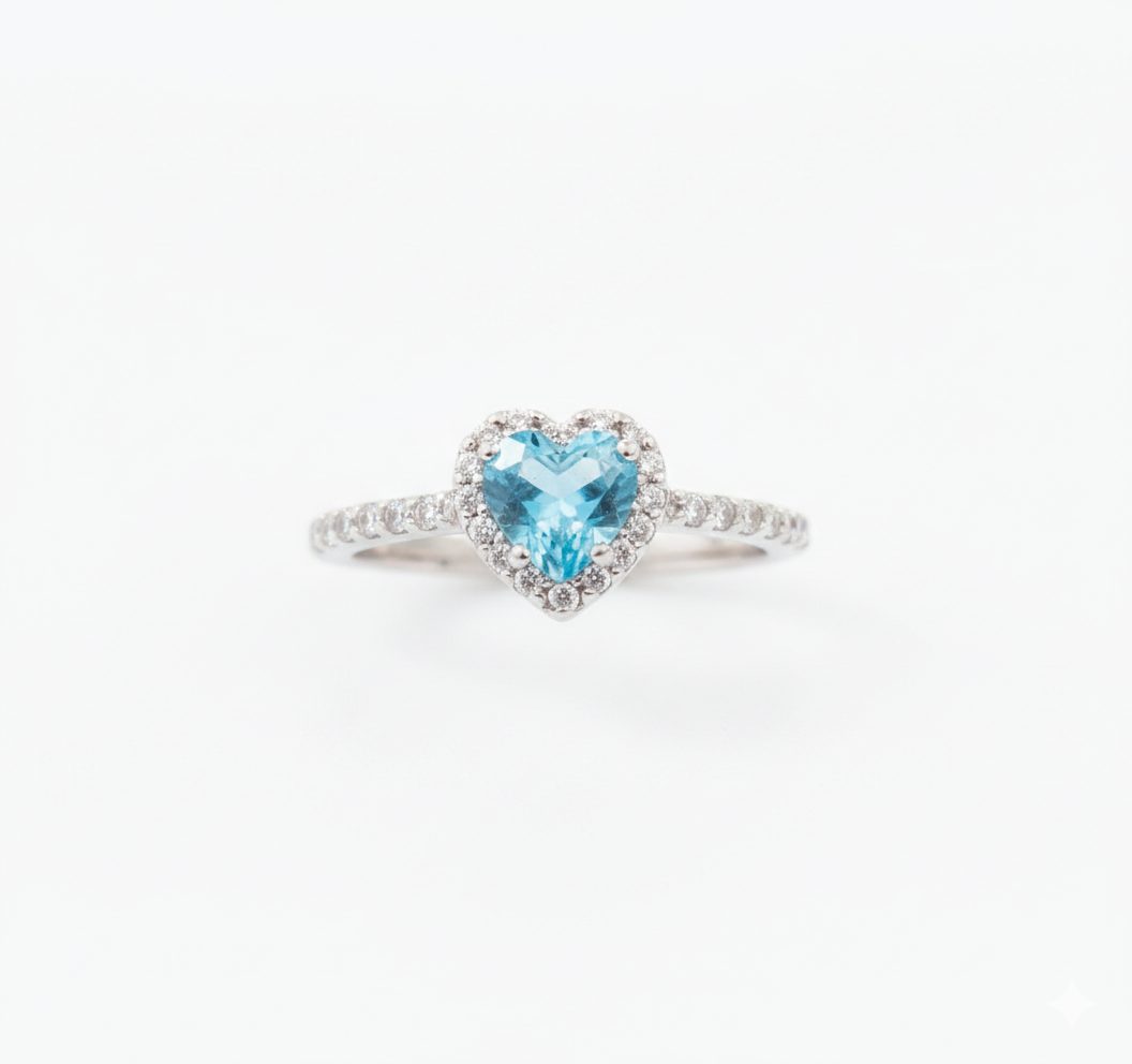 18ct white gold heart blue topaz ring; 0.50ct topaz with 0.72ct diamond halo and band; size M.5 luxury gemstone engagement or anniversary ring; 3.2g.