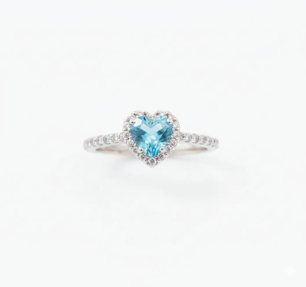 18ct white gold heart blue topaz ring; 0.50ct topaz with 0.72ct diamond halo and band; size M.5 luxury gemstone engagement or anniversary ring; 3.2g.