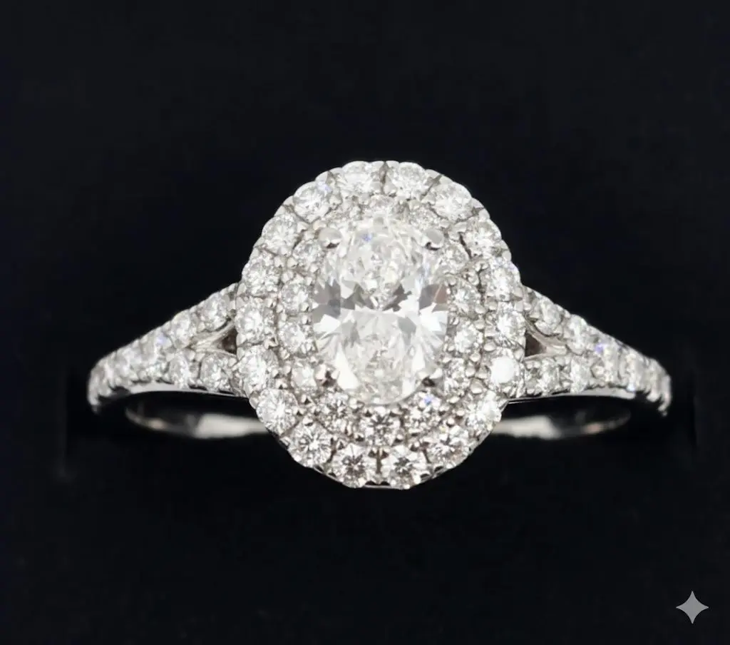 Platinum ring with oval diamond of 0.50ct. I, vs1 and 52round diamonds of 0.50ct. 6.87gr