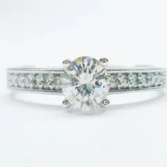 9ct White gold Engagement ring set with centre diamond of 0.40ct and 16 round diamond in band total of 0.24ct.
