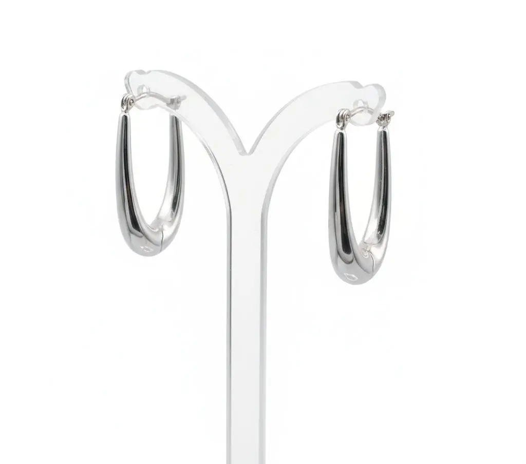 Fate White Gold Earrings (2) A pair of 9ct white gold teardrop earrings displayed on a clear acrylic stand, shown from a three-quarter side angle against a clean, solid white background.