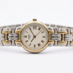 Refurbished, Classic Two-Tone, Swiss Made, and Roman Numeral Dial.