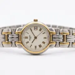 Refurbished, Classic Two-Tone, Swiss Made, and Roman Numeral Dial.