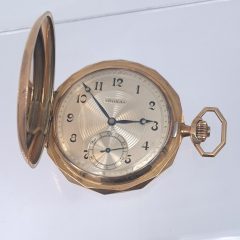 This 14ct. Yellow gold pocket watch, has a well-preserved Art Deco dial with a sunburst guilloche pattern and a clean sub-dial, which adds a premium for collectors.