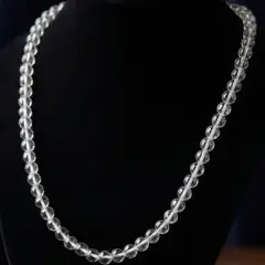 Screenshot_20260602_114626_Google Topaz round beads 4.5mm diameter, 42cm long with silver colour clasp.