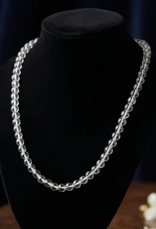 Topaz round beads 4.5mm diameter, 42cm long with silver colour clasp.