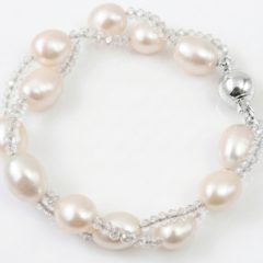 Elegant twisted freshwater pearl and crystal bracelet with a silver fish hook clasp, perfect for bridal or formal wear.