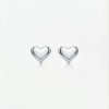 A pair of polished, high-shine silver heart-shaped stud earrings with push on butterflies.