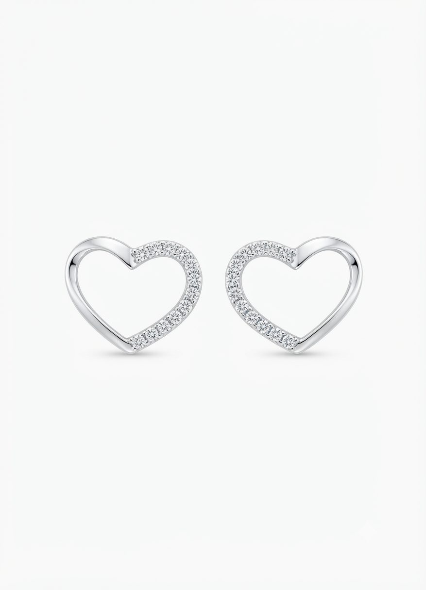 A pair of silver heart-shaped stud earrings featuring small cubic zirconia, set along one side of each heart, with push on butterflies.
