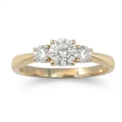 A timeless three-stone setting featuring a striking center diamond of 0.50ct. flanked by two matching side stones of 0.20ct. round brilliant cut lab grown diamonds, expertly crafted to maximize brilliance and fire.