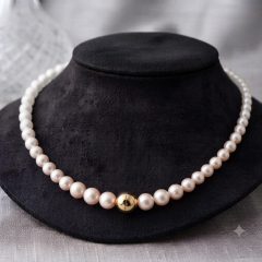 Elevate your everyday elegance with this classic high luster, bright white freshwater pearl necklace, 40cm long, with gold colour ball magnetic clasp for effortless wear.