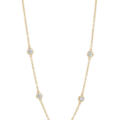 Elevate your everyday luxury with our yellow gold cubic Zirconia station necklace. Featuring sparkling Cubic Zirconia in bezel setting.