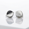 Sterling silver leaf-shaped stud earrings with a polished finish designed for clip on earrings.