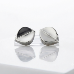 Sterling silver leaf-shaped stud earrings with a polished finish designed for clip on earrings.
