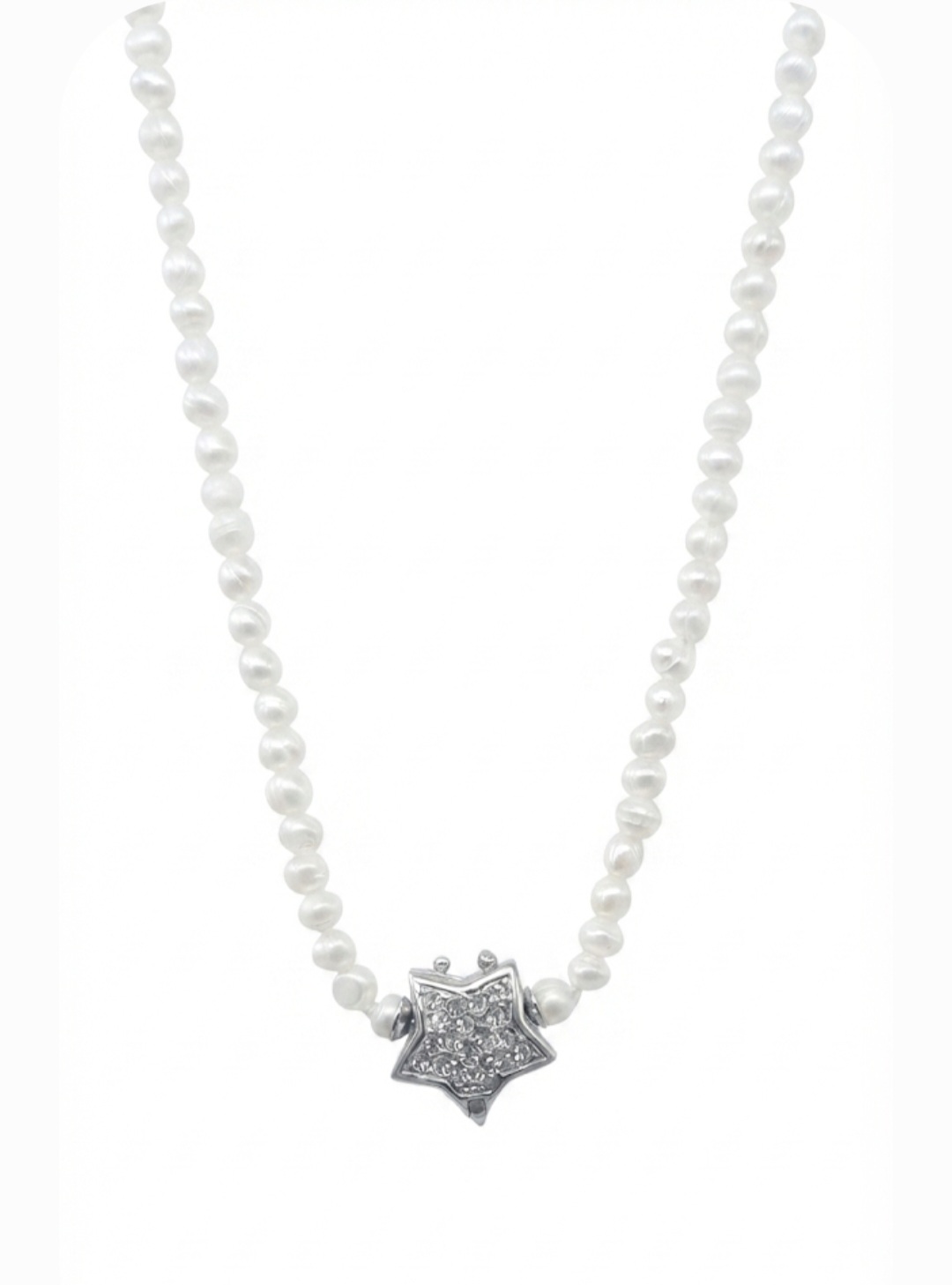 White Freshwater pearl necklace featuring a glittering silver star-shaped front clasp embellished with cubic zirconia stones. 40cm long